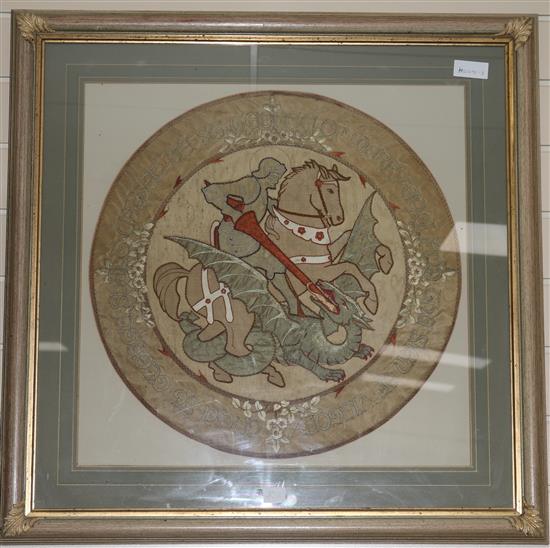 An Arts and crafts St George and the Dragon embroidered silk panel 21in.